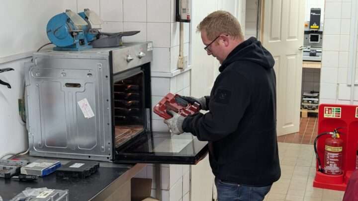 Tom Perry putting and ECU in the oven